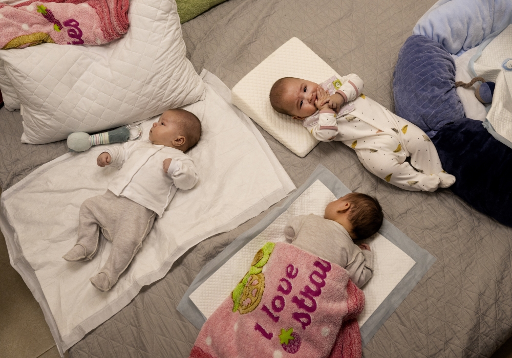 Some of the 19 babies born to Ukrainian surrogate mothers, now being cared for by nannies and sheltered during the Russian invasion at a basement nursery in Kyiv, March 11, 2022. (Lynsey Addario/The New York Times)
