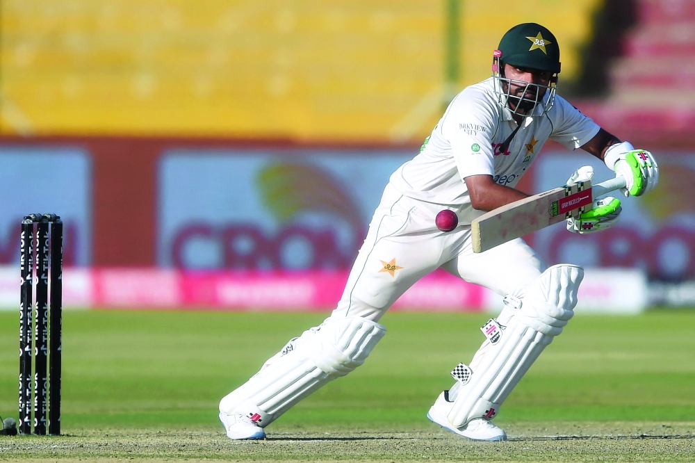 Pakistan's captain Babar Azam plays a shot during the fourth day of the second Test against Australia at the National Stadium in Karachi. -- AFP