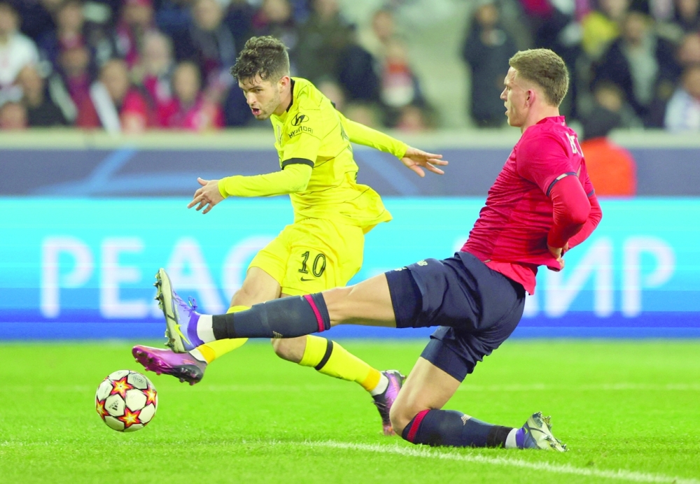 Chelsea's Christian Pulisic scores their first goal. -- Reuters