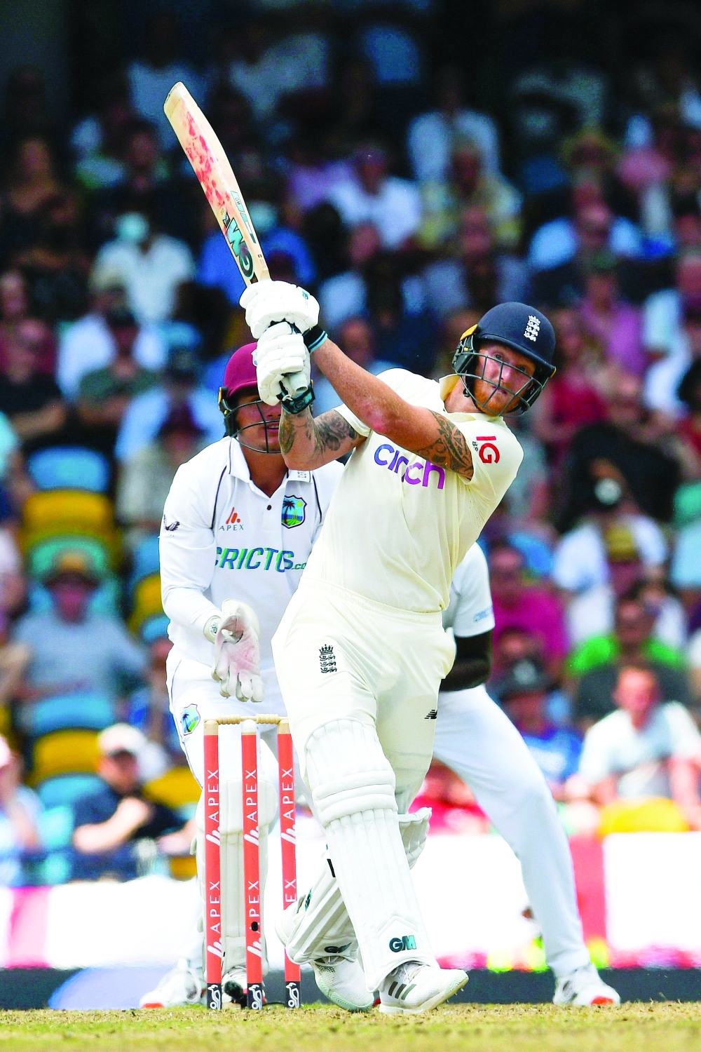 Ben Stokes of England hits a six during the second day of the second Test at Kensington Oval, Barbados. -- AFP