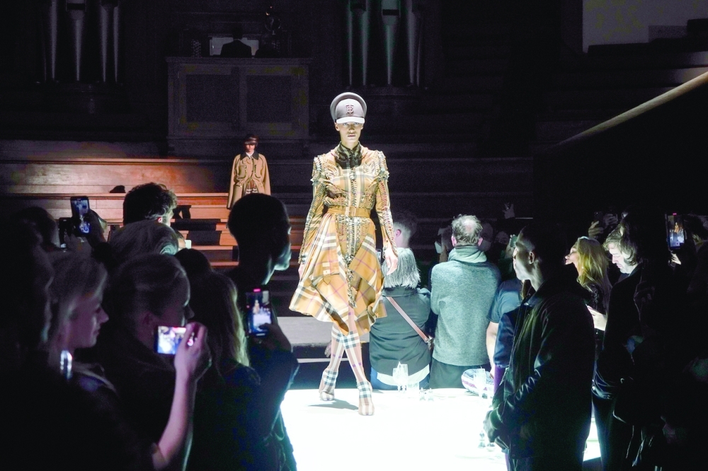 Models present looks for Burberry 2022 Fashion show in London, Feb. 11, 2022. (Andrew Testa/The New York Times)