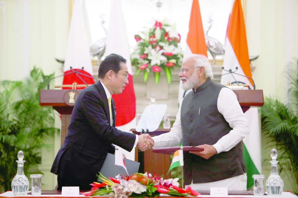 Japanese Prime Minister Fumio Kishida and Indian Prime Minister Narendra Modi during the signing of an agreement in New Delhi.  - Reuters
