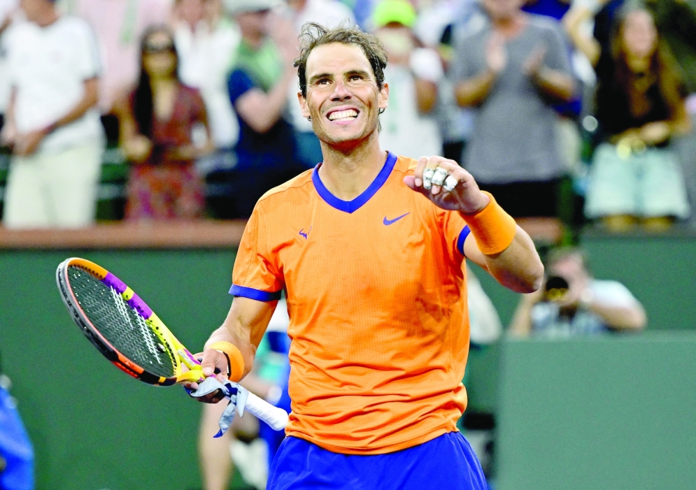 Rafael Nadal celebrates after defeating Carlos Alcaraz in their semifinal match in the BNP Paribas Open. -- USA Today Sports