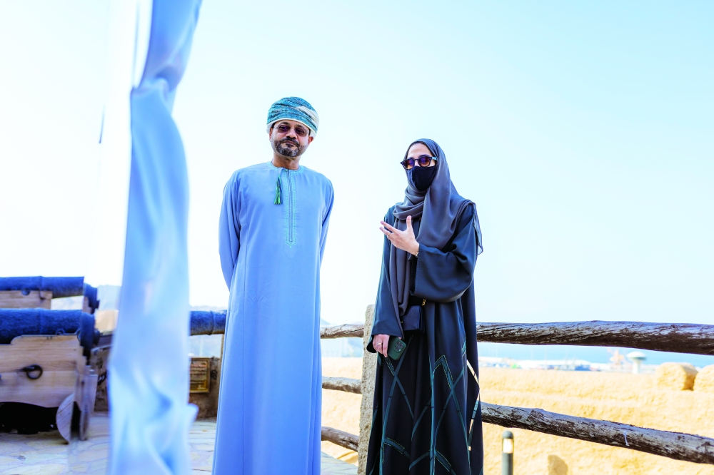 H.E. Sayyid Badr Albusaidi with Omani artist Majeda Alhinai. Image by Burair Alkishri