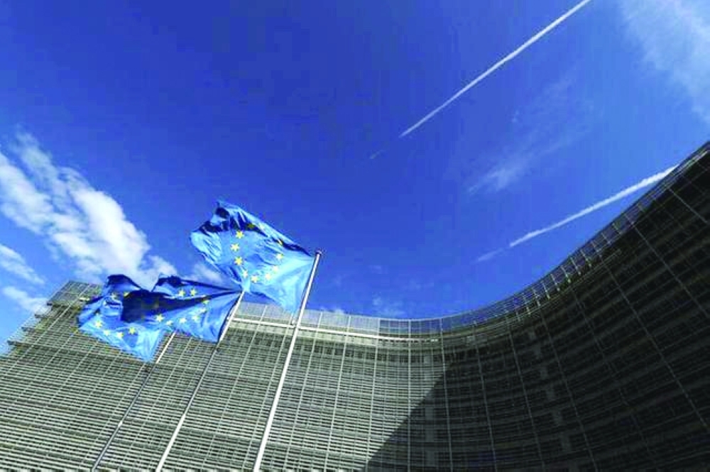European Union flags flutter outside the European Commission headquarters in Brussels, Belgium.  — Reuters