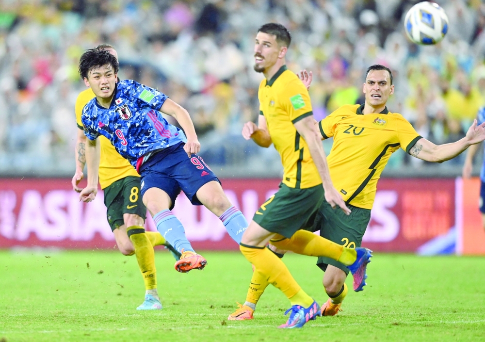 Soccer Football - World Cup - Asian Qualifiers - Group B - Australia v Japan - Stadium Australia, Sydney, Australia - March 24, 2022 Japan's Ayase Ueda shoots at goal REUTERS/Jaimi Joy
