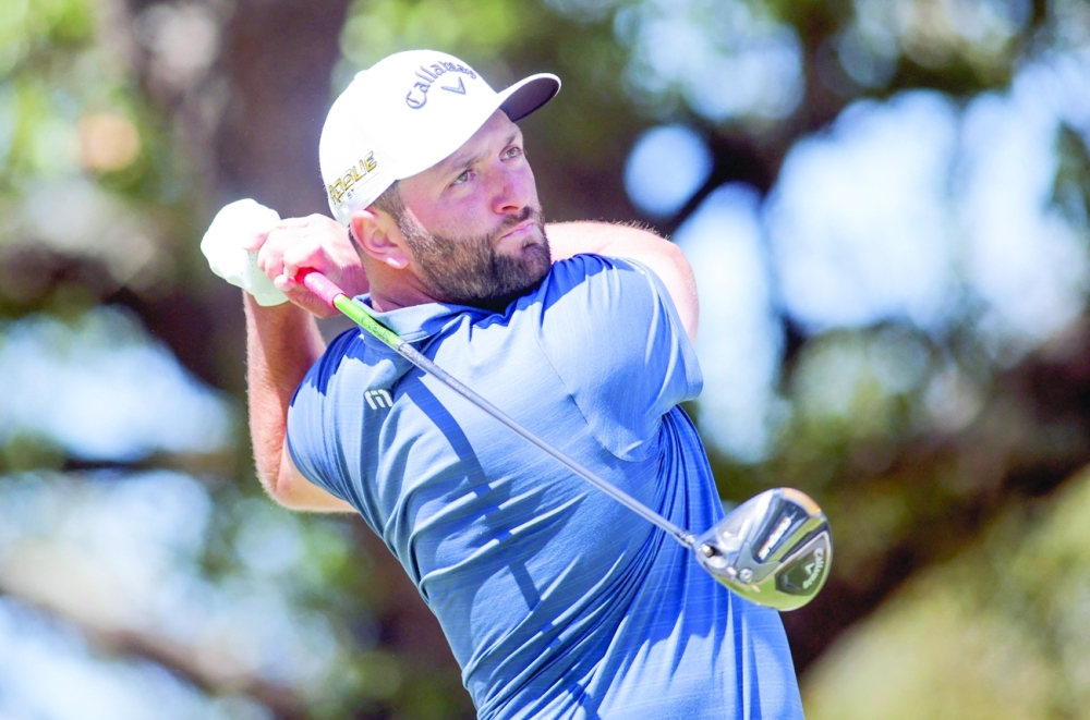Jon Rahm tees off on the 8th hole during the first round of the World Golf Championships-Dell Technologies Match Play golf tournament. -- USA Today Sports