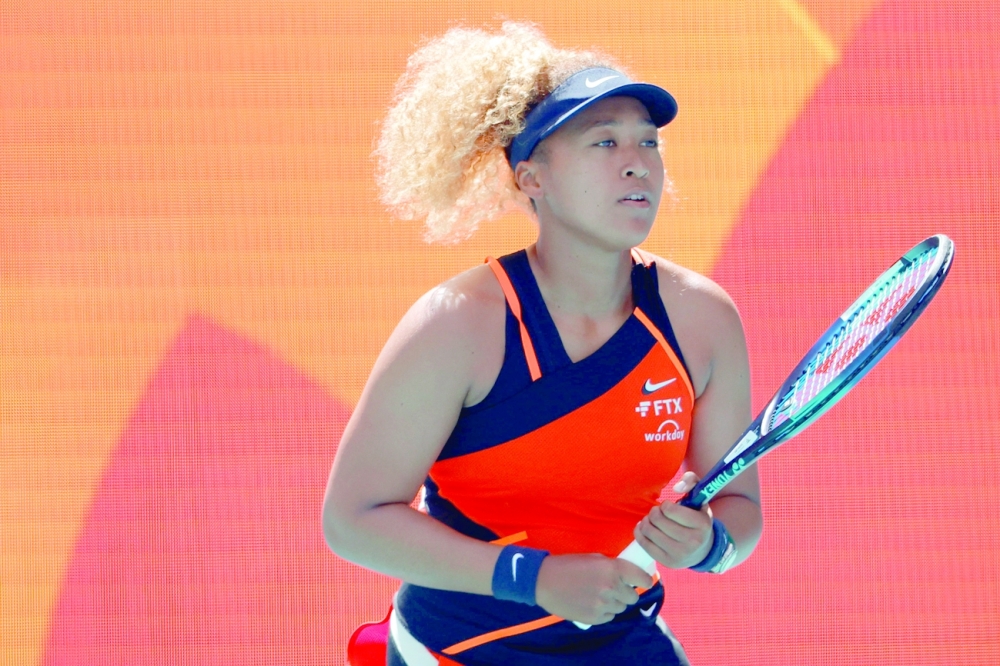 Naomi Osaka warms up prior to her match against Astra Sharma in the Miami Open. -- USA Today Sports
