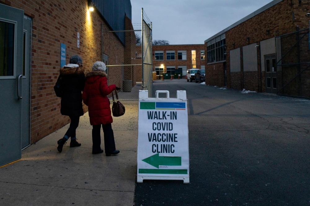 A COVID-19 vaccination site at a high school in Berkley, Mich., Jan. 20, 2022. (Emily Elconin/The New York Times)