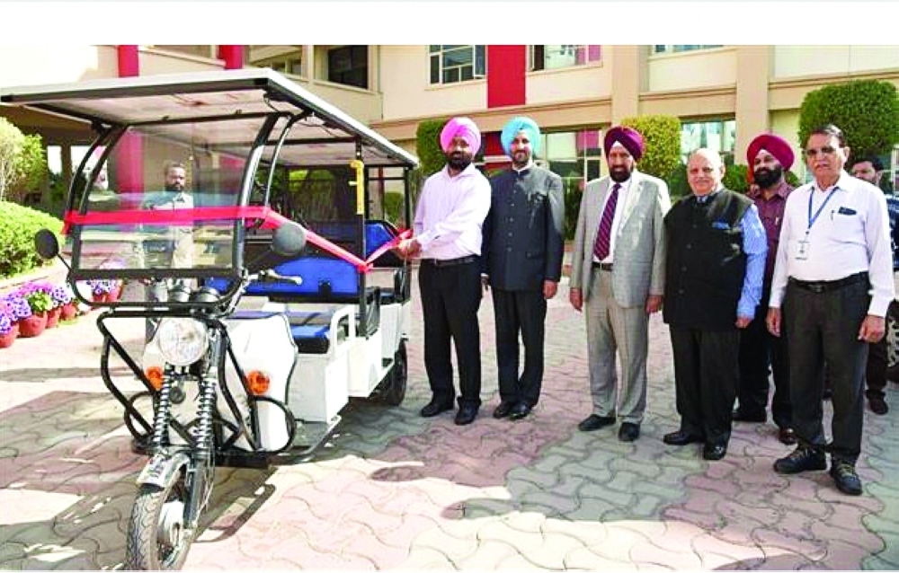 GGI Amritsar faculty members and students with solar-powered e-rickshaw built by the Institute students. Source: Tribune