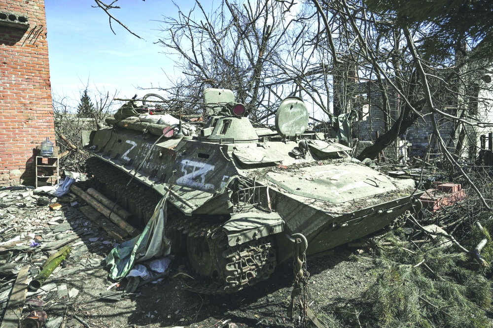 An abandoned Russian armoured vehicle in the village of Mala Rogan, east of Kharkiv.  - AFP

