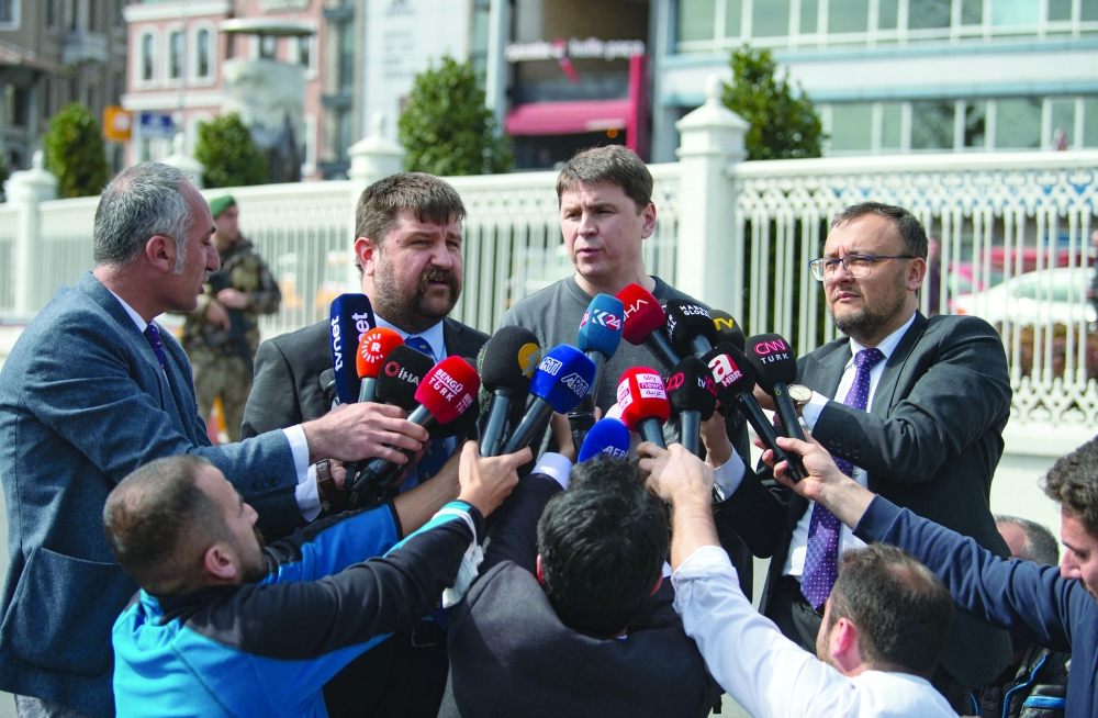 Ukrainian presidential adviser Mykhailo Podolyak speaks to the press after first Russia and Ukraine face-to-face talks at Dolmabahce palace in Istanbul. - AFP