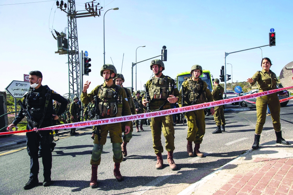 Israeli soldiers patrol a village south of Jenin in the occupied West Bank. -- AFP