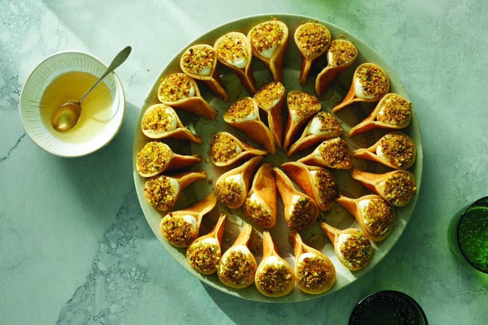 A tray of qatayef, the stuffed semolina pancakes that are a traditional Ramadan staple. (David Malosh/The New York Times)