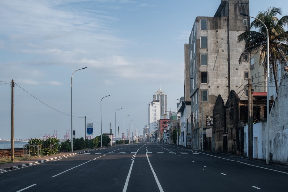 Empty streets in Colombo on Sunday, April 3, 2022 during a curfew intended to prevent planned demonstrations. (Rebecca Conway/The New York Times)