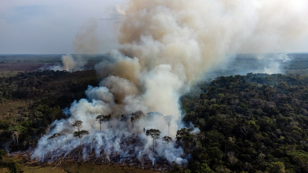 An aerial view of a fire set by farmers for deforestation in the Amazon jungle near Caqueta, Colombia on Feb 13, 2021.  (Federico Rios/The New York Times)