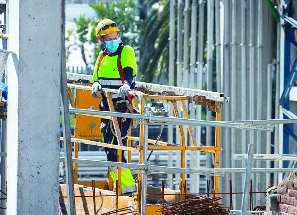 Construction workers return to work under Covid-19 conditions.
