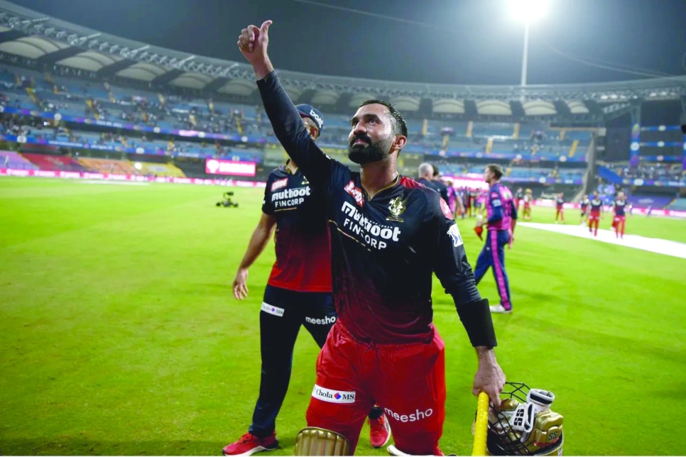 RCB's Dinesh Karthik gestures after beating Rajasthan Royals.