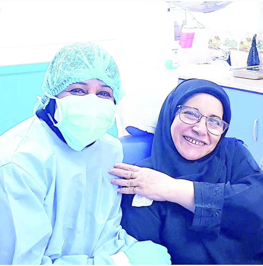 Dr Hafsa Banu with a patient during Ramadhan