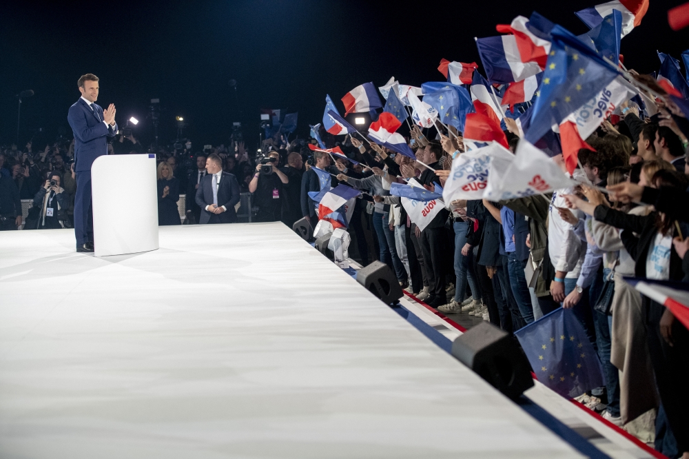 President Emmanuel Macron speaks in Paris after the election projections were announced on Sunday, April 10, 2022. (James Hill/The New York Times)