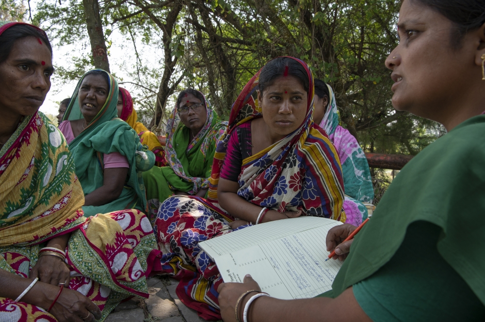 Madhumita Bagh, right, who oversees the mangrove efforts in the village of Gobardhanpur, India, March 7, 2022. (Saumya Khandelwal/The New York Times)