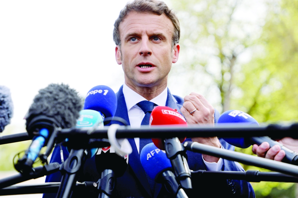 France's President Emmanuel Macron addresses media during a one-day campaign visit in the Grand-Est region in eastern France. - AFP