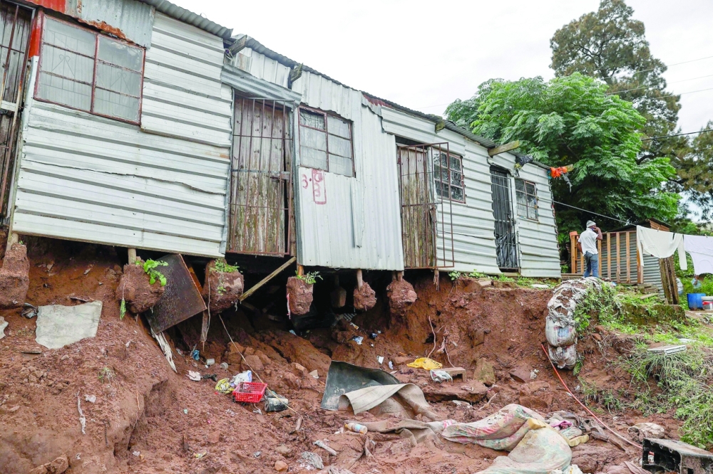 A general view of a damaged structure after a mudslide destroyed the floor near Durban. -- AFP)