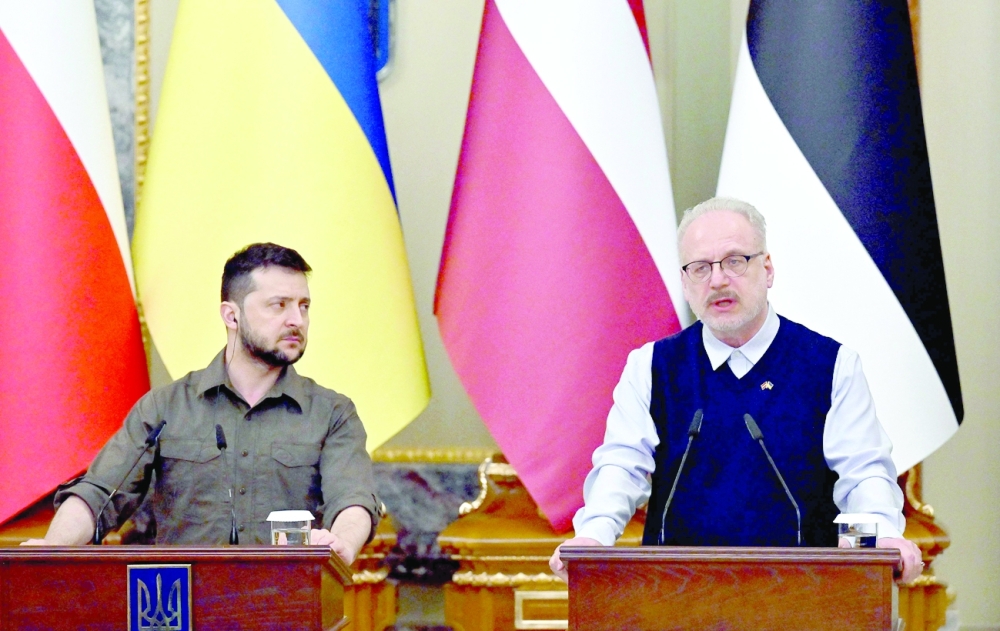 President of Ukraine Volodymyr Zelensky with his Latvian counterpart Egils Levits during a press conference in Kyiv. - AFP