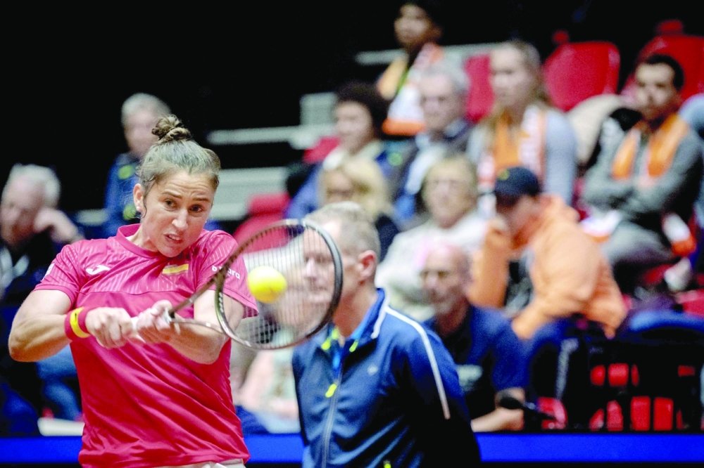Spain's Sara Sorribes plays a forehand return to Netherlands' Arantxa Rus during their singles match of the qualifying round between Netherlands and Spain for The Billie Jean King Cup at The Maaspoort Sports and Events in s-Hertogenbosch on April 16, 2022. Netherlands OUT
 (Photo by Sander Koning / ANP / AFP)