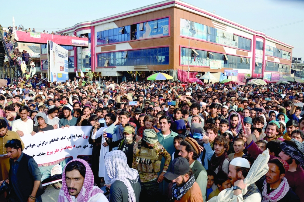 Demonstrators take part in a protest against Pakistani airstrikes in Khost Province, in Khost on Saturday. - AFP