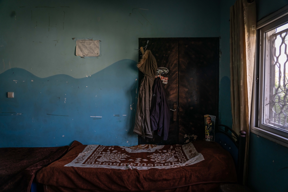 The bedroom of Muhammad Zakarna, whose mother said was among the 14 or more Palestinians killed by Israeli forces since the beginning of Ramadan, in Jenin, in the West Bank, on April 15, 2022. (Samar Hazboun/The New York Times)