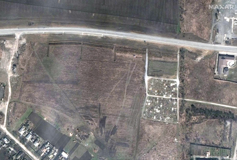 In satellite image from Maxar Technologies, an area with what appears to be a growing mass grave site on the outskirts of Mariupol, Ukraine, April 3, 2022. (Satellite image ©2022 Maxar Technologies via The New York Times)