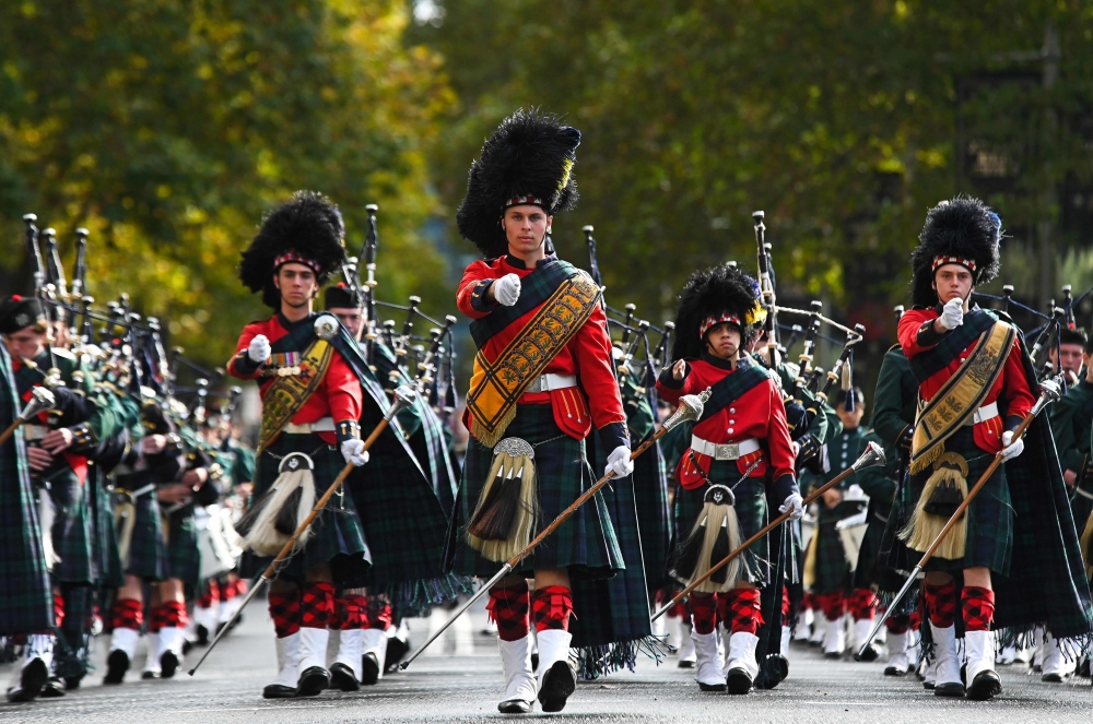 People participate in the annual parade to mark ANZAC Day in Sydney. - AFP 