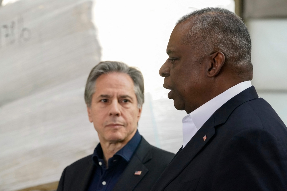 Secretary of Defence Lloyd Austin and Secretary of State Antony Blinken with reporters after returning from their trip to Kyiv and meeting with Ukrainian President Zelensky. - AFP