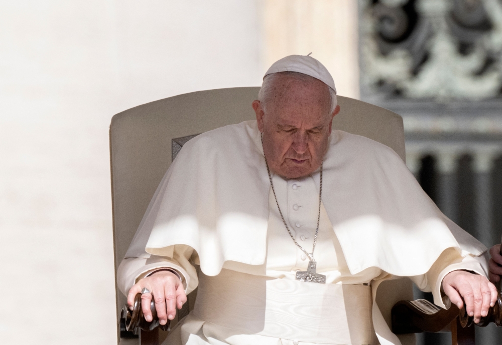 Pope Francis holds a weekly general audience on Saint Peter's square in the Vatican on April 27, 2022.  (Photo by Tiziana FABI / AFP)


