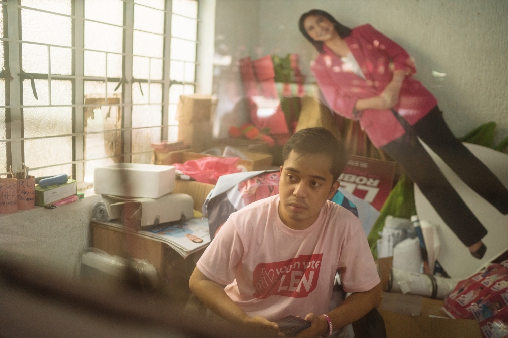 John Benvir Serag, a junior high school teacher and a volunteer for the Youth Vote for Leni campaign for Leni Robredo, the vice president of the Philippines who is running for president, in Valenzuela City, April 12, 2022. (Hannah Reyes Morales/The New York Times)
