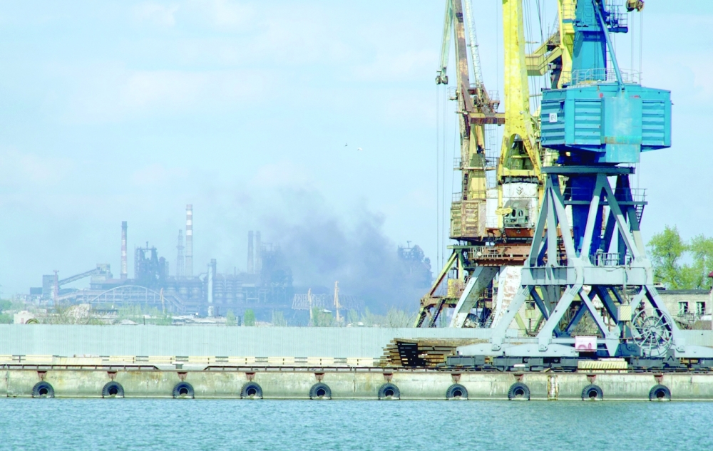 Smoke rises above the Azovstal steel plant in the city of Mariupol on April 29 amid the ongoing Russian military action in Ukraine. — AFP