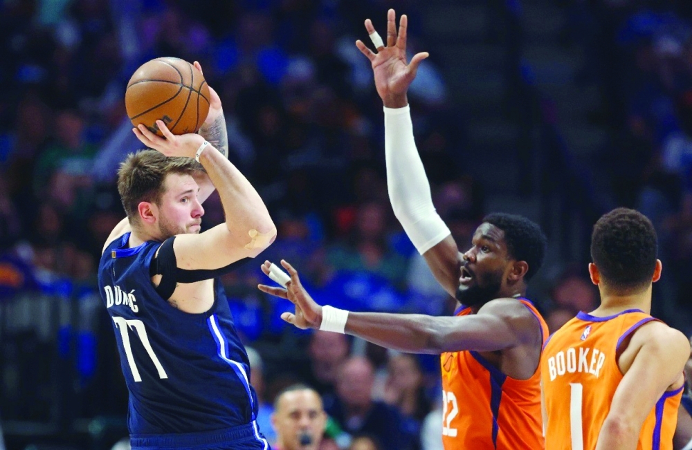 luka-doncic-of-dallas-pass-deandre-ayton-mavericks-111-101-nba-playoff-victory-phoenix
