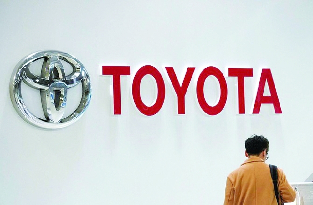 A man is seen inside Toyota showroom in Tokyo. — AFP