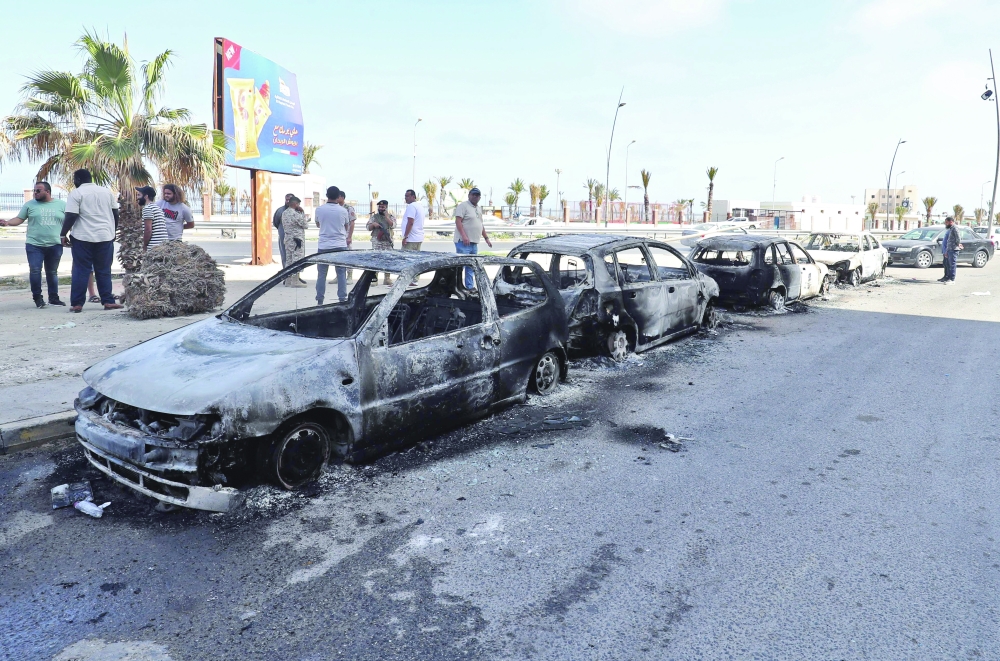 A view of vehicles destroyed during fighting between forces loyal to the Tripoli-based Prime Minister Dbeibah and rival forces of the Tobruk-based government in Tripoli. — AFP