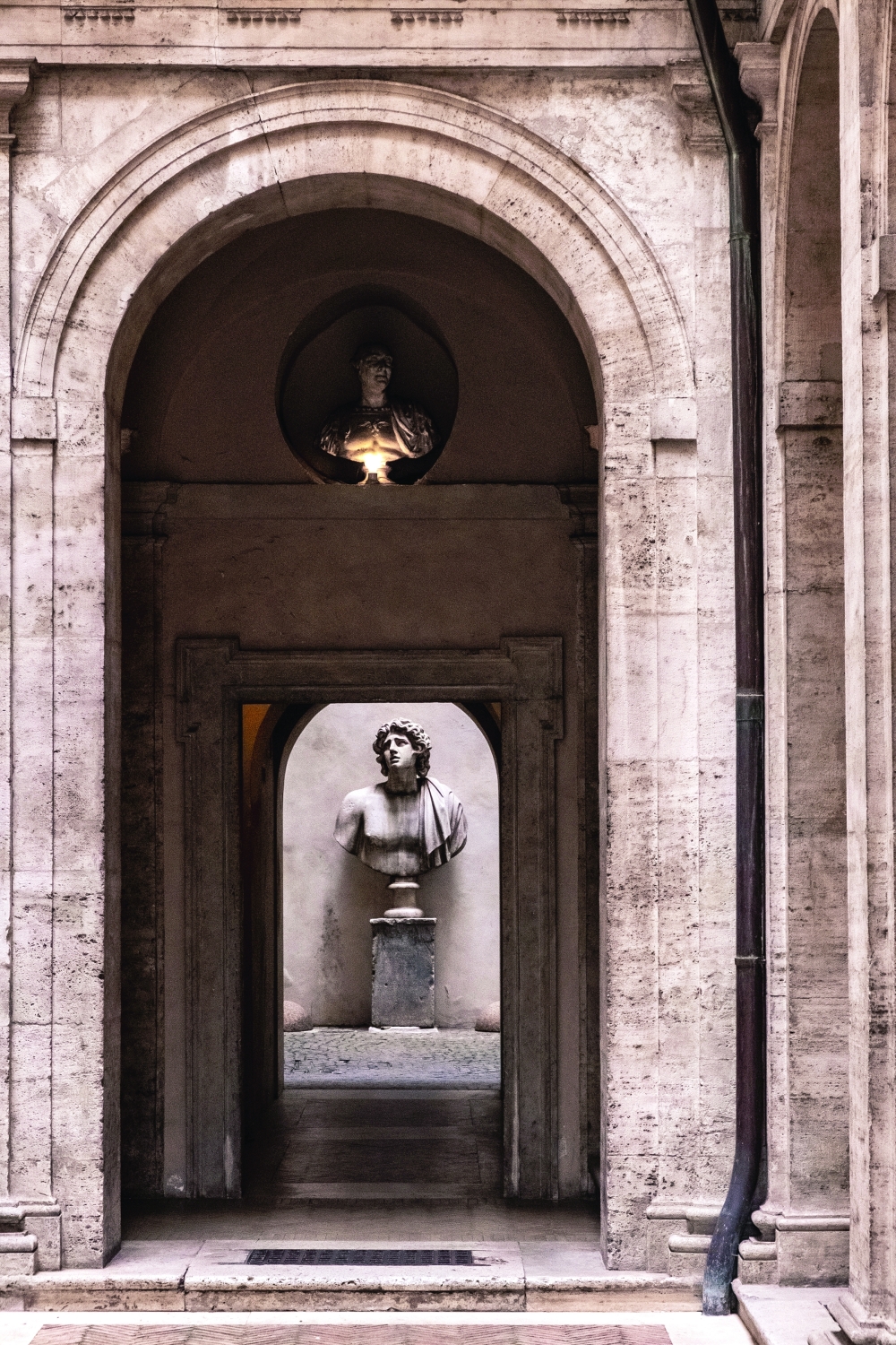 Doorways and statuary at Piazza Navona in Rome, May 5, 2022. (Francesco Lastrucci/The New York Times)
