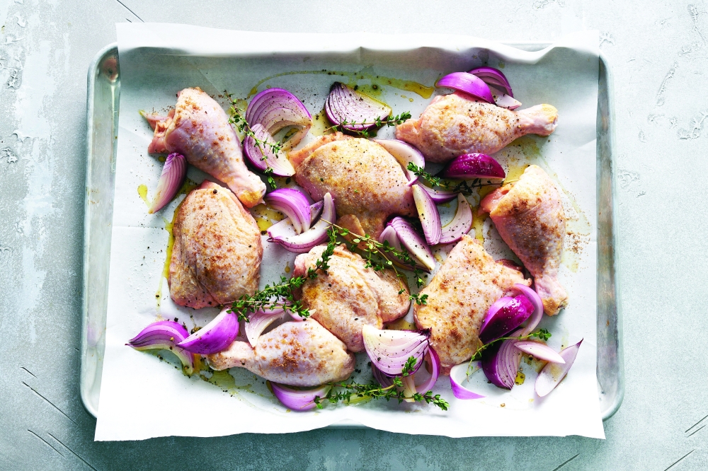 Sheet-pan chicken with rhubarb and red onion in New York, May 12, 2022. Food styled by Simon Andrews. (David Malosh/The New York Times)
