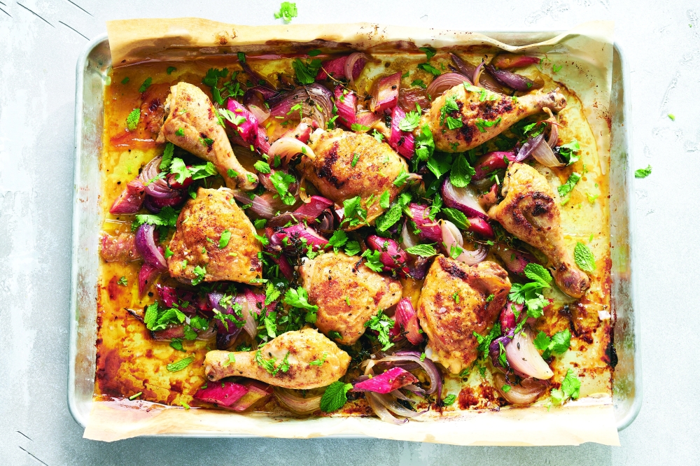 Sheet-pan chicken with rhubarb and red onion in New York, May 12, 2022. Food styled by Simon Andrews. (David Malosh/The New York Times)