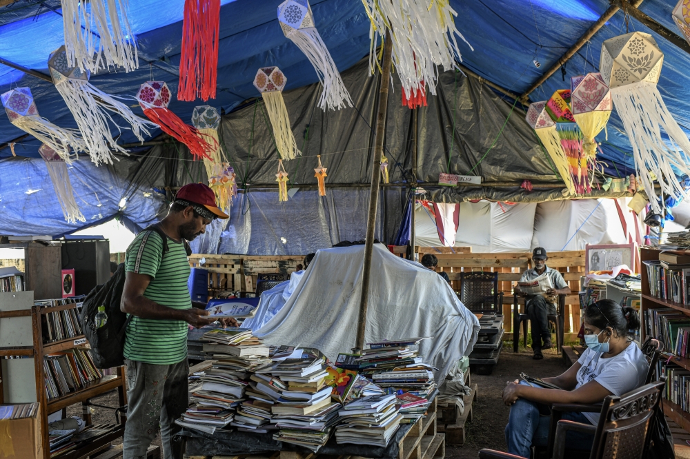 A library at the “Gota Go” protest village in Colombo, Sri Lanka, May 20, 2022. (Atul Loke/The New York Times)