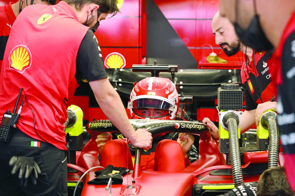 Ferrari's Monegasque driver Charles Leclerc sits in his car during the second free practice session at the Circuit de Catalunya on May 20, 2022 in Montmelo on the outskirts of Barcelona ahead of the Spanish Formula One Grand Prix. (Photo by LLUIS GENE / AFP)