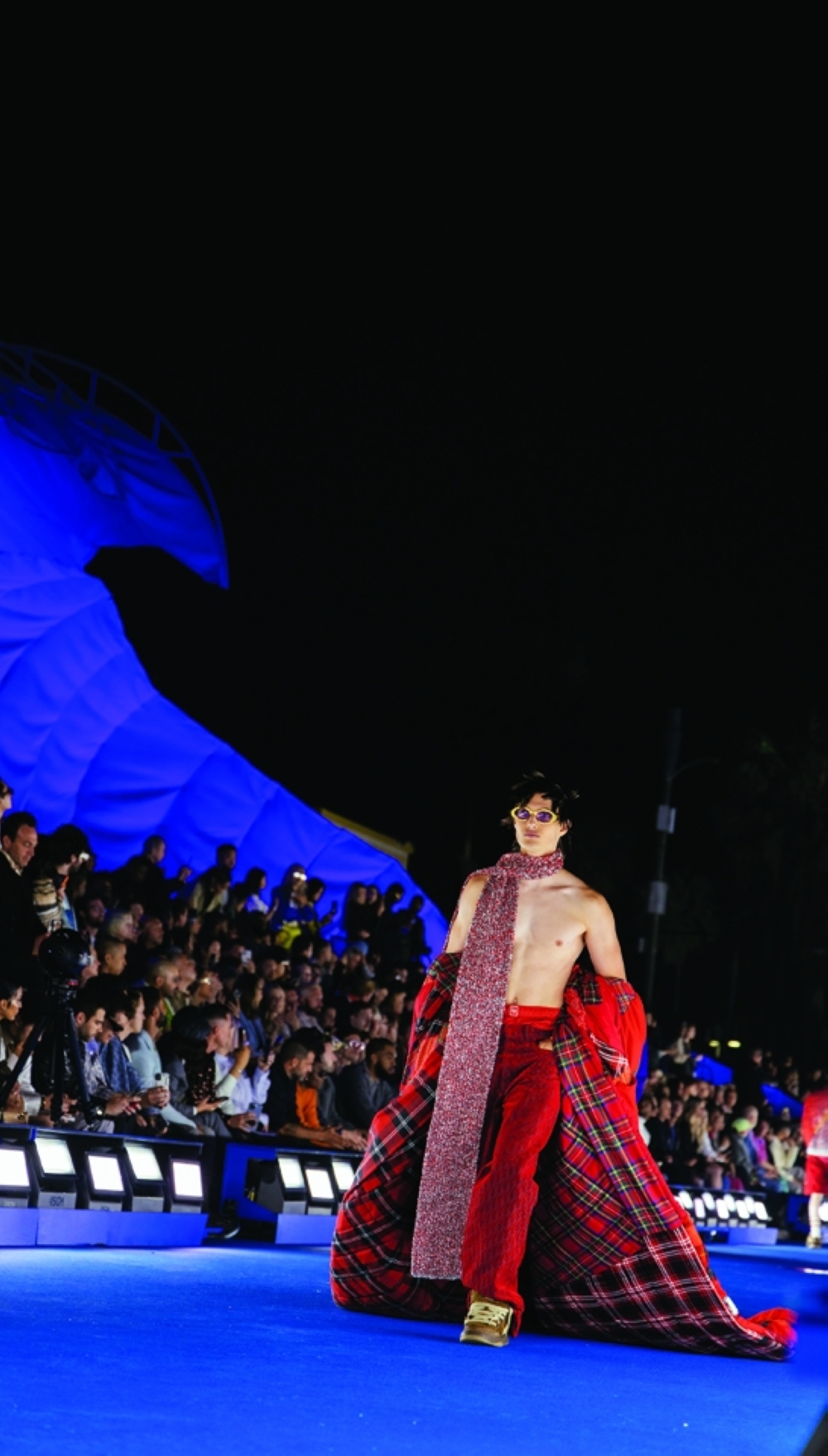 Looks from Dior Men’s resort 2023 collection, shown in the Venice neighborhood of Los Angeles, May 19, 2022. (Michael Tyrone Delaney/The New York Times)