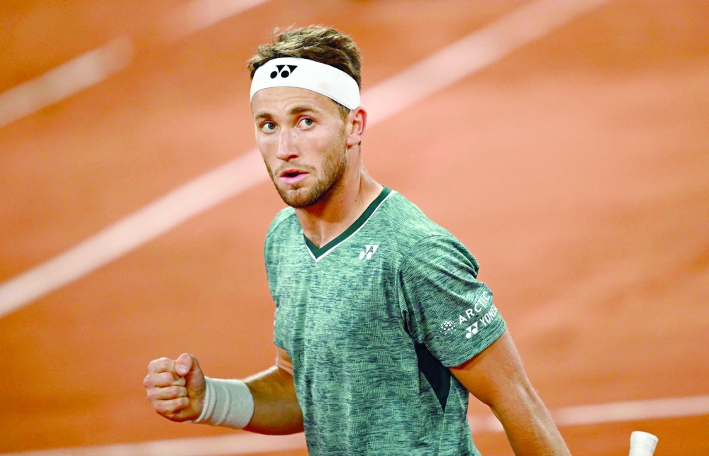 Norway's Casper Ruud reacts after a point against Denmark's Holger Rune. -- AFP