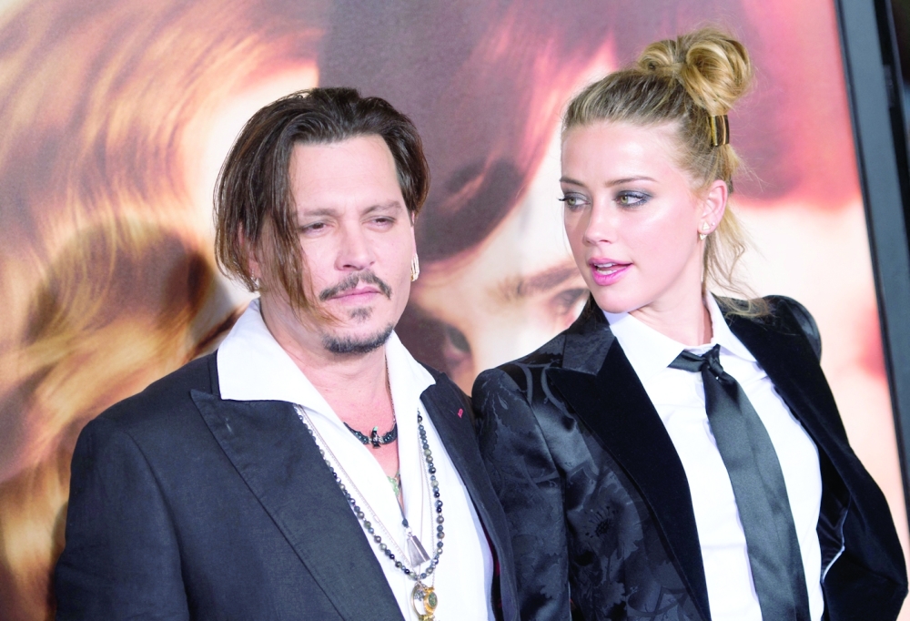 Johnny Depp and Amber Heard. - AFP file photo