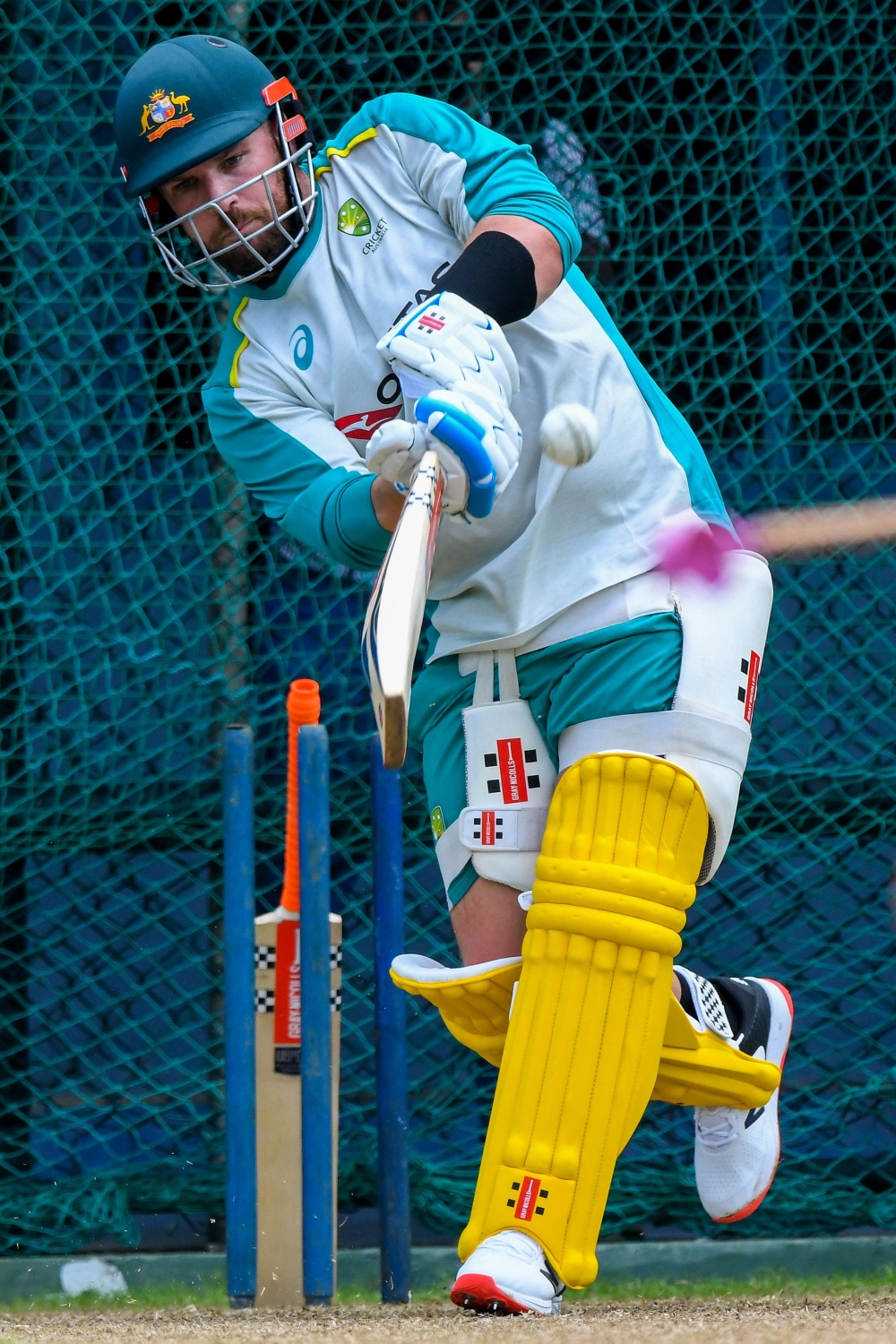 Australia's captain Aaron Finch bats during a practice session at the R. Premadasa Stadium in Colombo. -- AFP