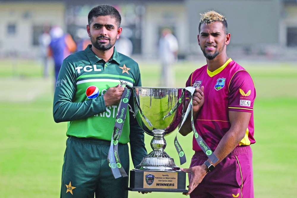 Pakistan's captain Babar Azam (L) and his West Indies' counterpart Nicholas Pooran pose with the ODI series trophy during a ceremony. -- AFP